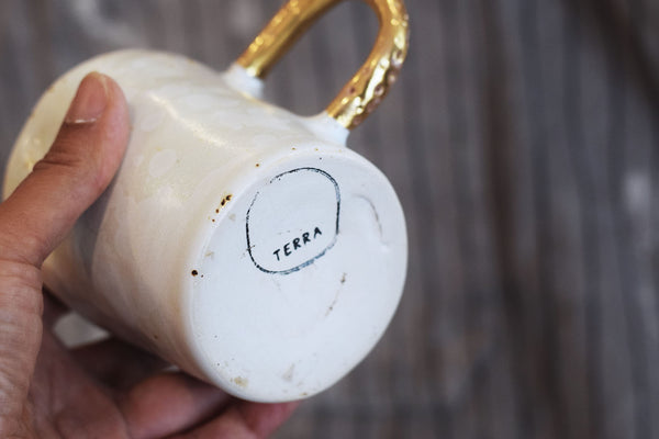 Organic cylinder mug w/ gold handle