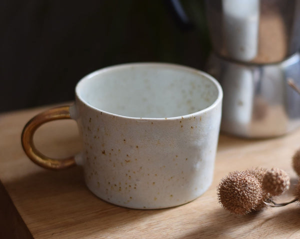Organic white cylinder mug w/ gold handle