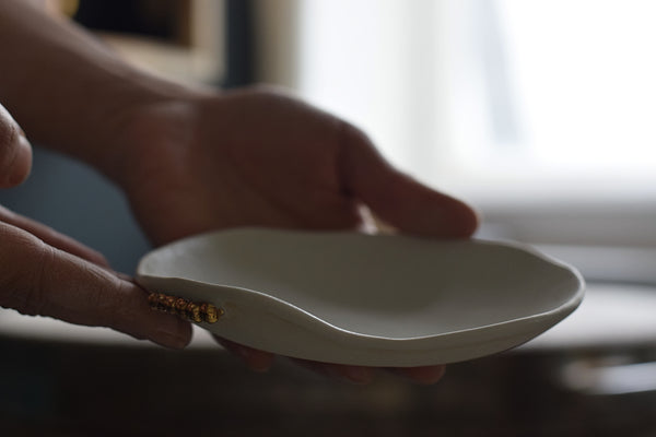 Earthy porcelain desert plate w/ gold pearls