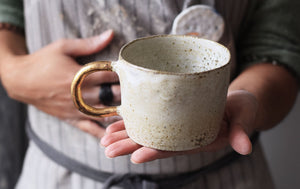 Organic cylinder mug w/ gold handle