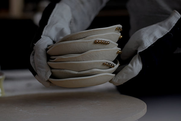 Earthy porcelain desert plate w/ gold pearls