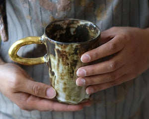 Rustic large gold handle mug